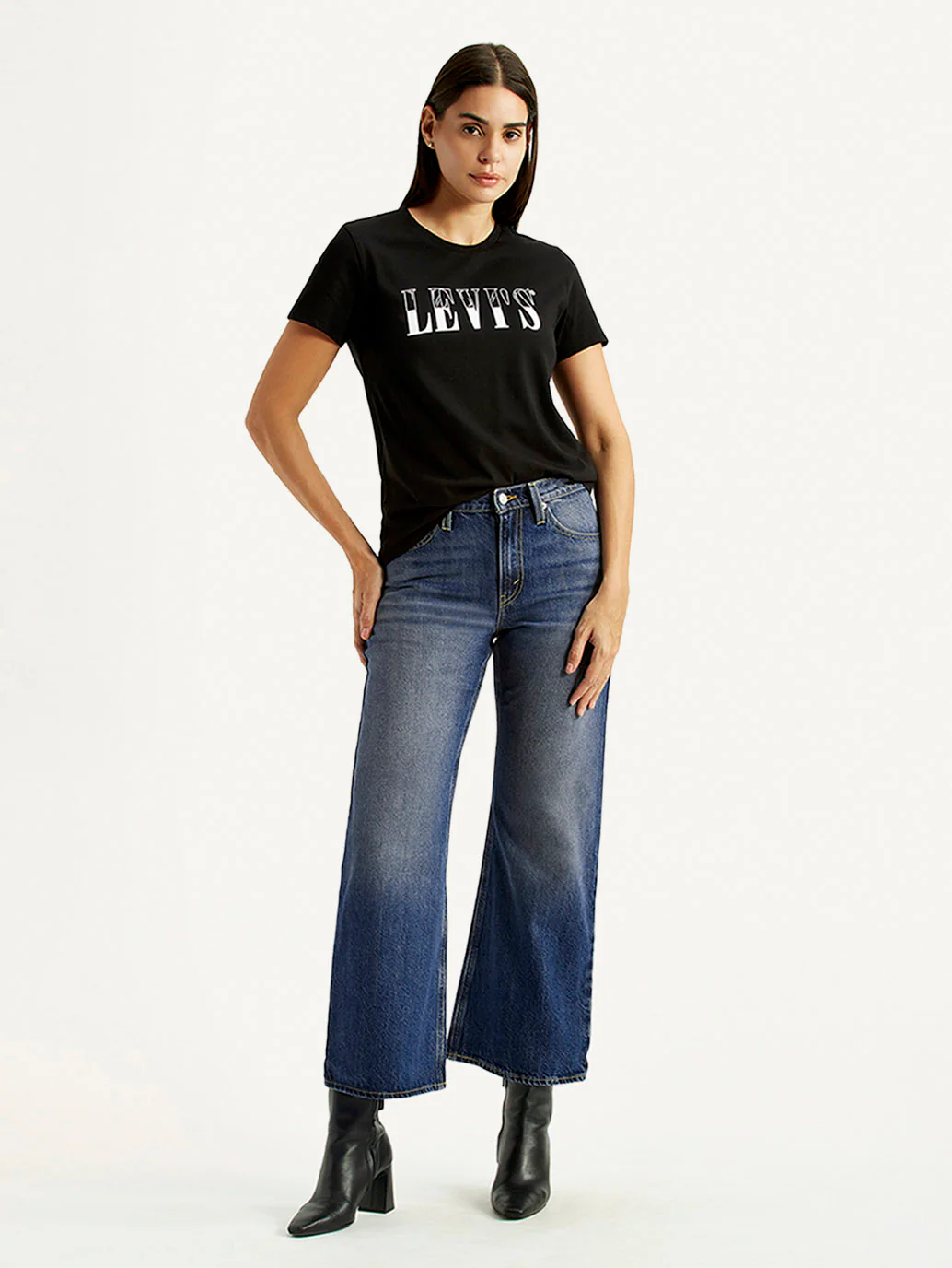 Women's Tinted Blue Loose Bootcut Fit Mid Rise Jeans